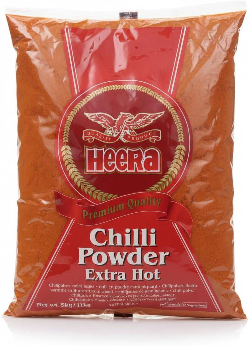 Heera Extra Hot Chilli Powder 5kg in a bulk catering spice bag, vibrant red spice for cooking and flavor enhancement.