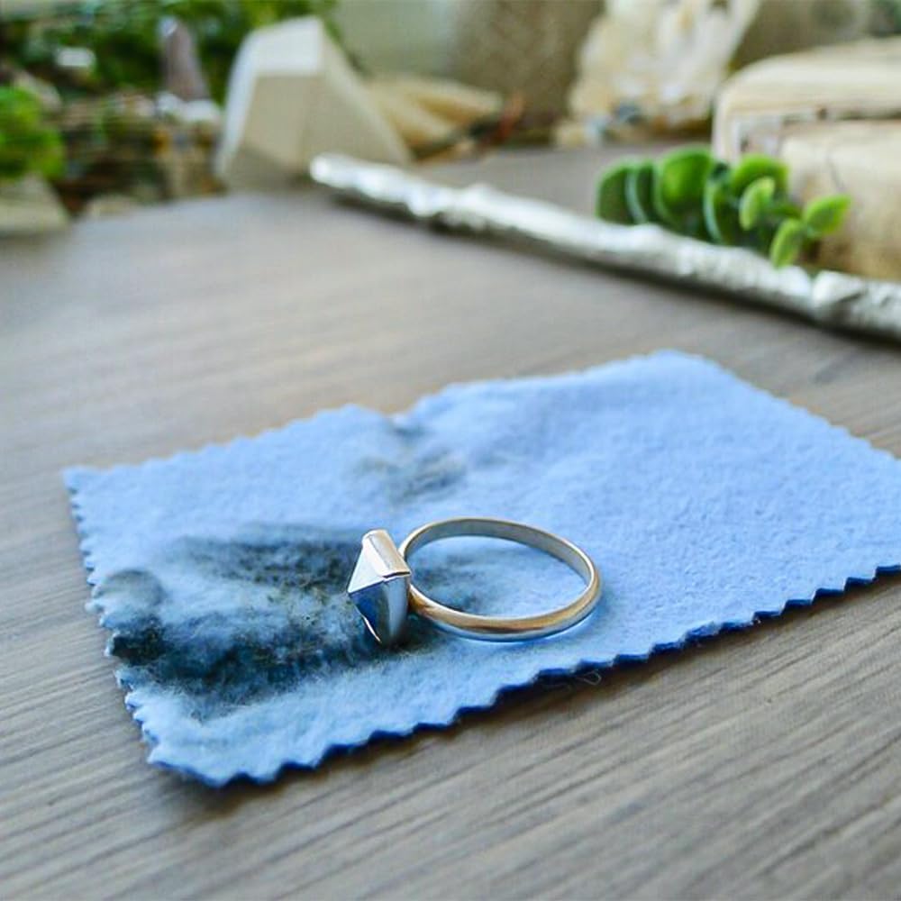 Goddard's Silver Polish Cloth for jewelry and silverware care, showing a soft cloth with silver cleaning and polishing features.