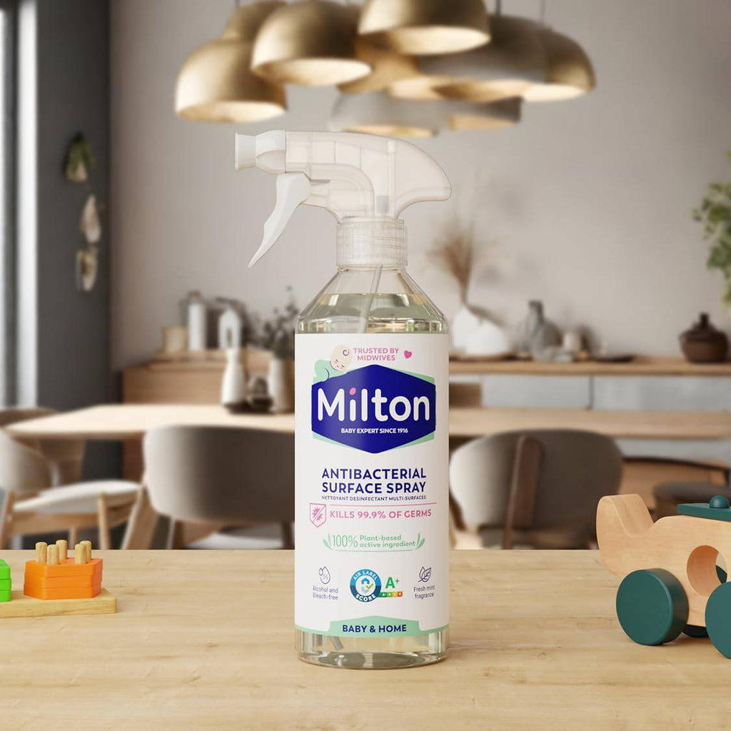 Milton antibacterial surface spray 500ml in a spray bottle, baby-safe disinfectant for cleaning and sanitizing surfaces.