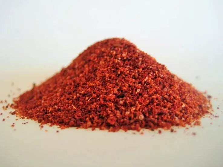 Heera Tandoori Curry Masala Powder in a bowl, showcasing vibrant red spice blend for authentic Tandoori dishes, 1kg and 5kg bulk sizes