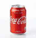 Full case of 24 Coca-Cola Original Taste 330ml soft drink cans, showcasing the classic red Coca-Cola branding and cans.