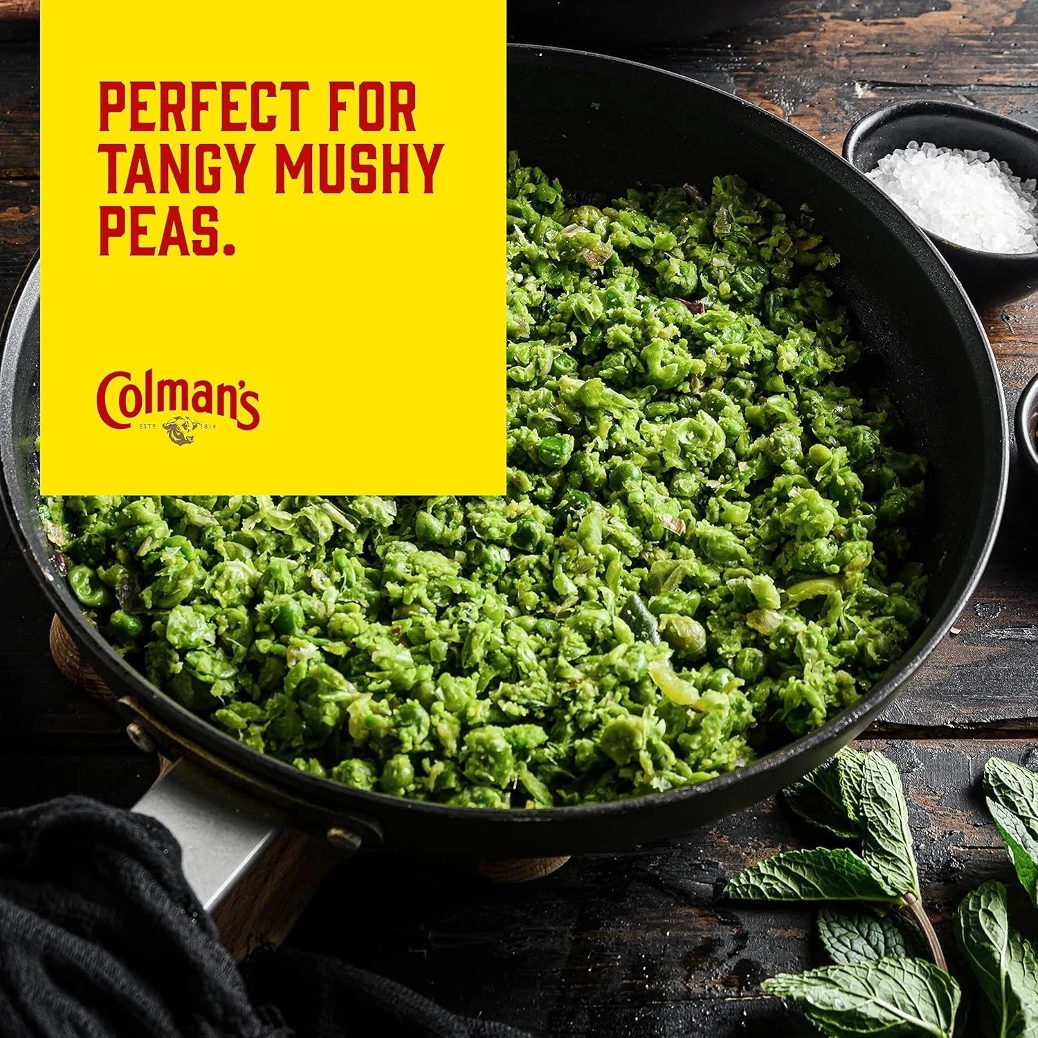 Two bottles of Colman's Mint Sauce 165g, classic British mint sauce with fresh green mint leaves and a clear label.