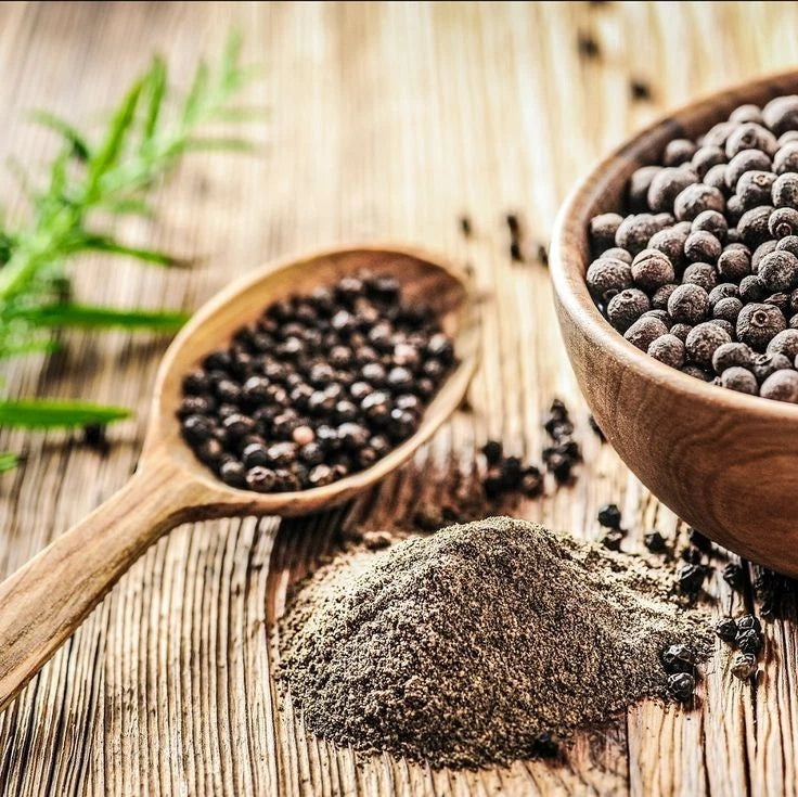 Heera black pepper coarse 1kg in a clear jar, showing dark, coarse ground pepper for cooking and grinders.