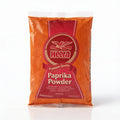 Heera paprika powder in a 1kg or 5kg bulk package, ground spice for cooking and catering, vibrant red spice in a clear container.