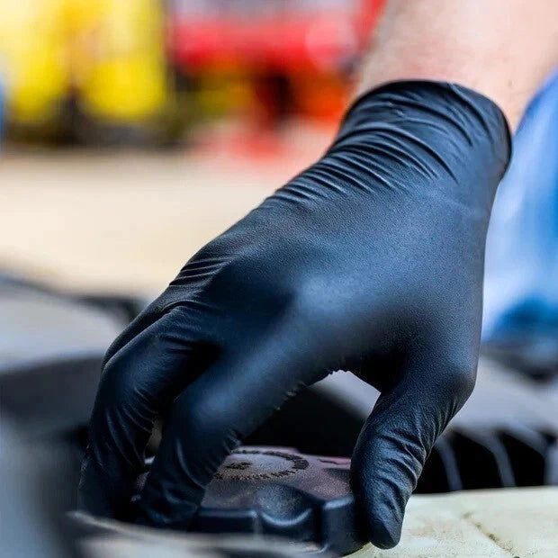 Black nitrile disposable gloves by Reign Goods, powder-free and latex-free, food safe catering gloves in L and XL sizes.