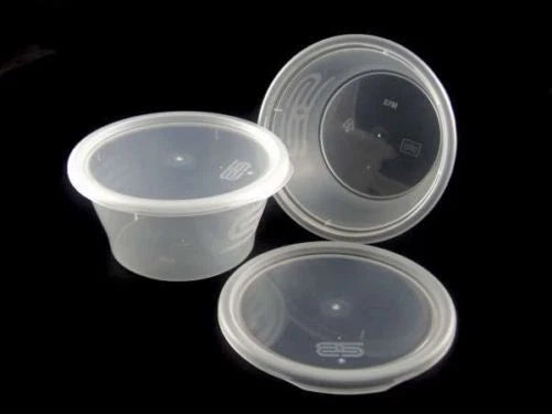 Set of five clear plastic Reign Goods 8oz round sauce pots with lids, BPA-free, microwave and freezer safe, for food storage.