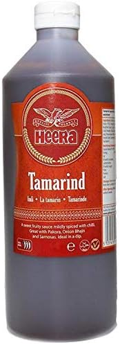 Reign Goods Heera Tamarind Sauce 1L, authentic Indian tamarind dipping and cooking sauce in a clear bottle.