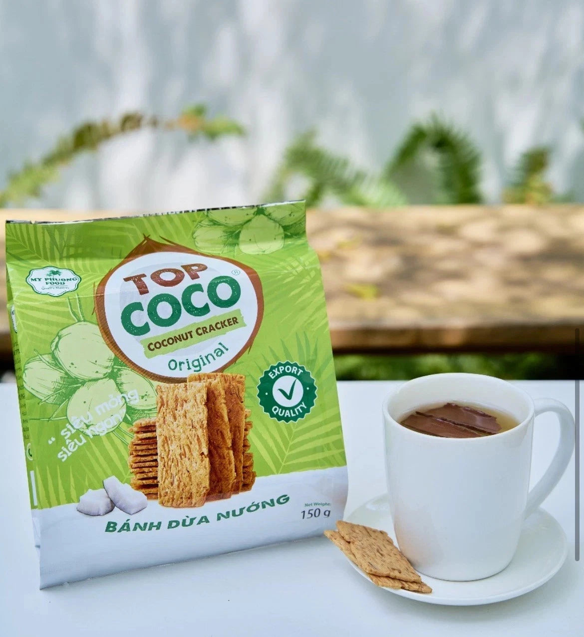 Reign Goods TopCoco Vietnamese roasted coconut crackers snack, crispy, natural, vegan-friendly, packed in multiple quantities.