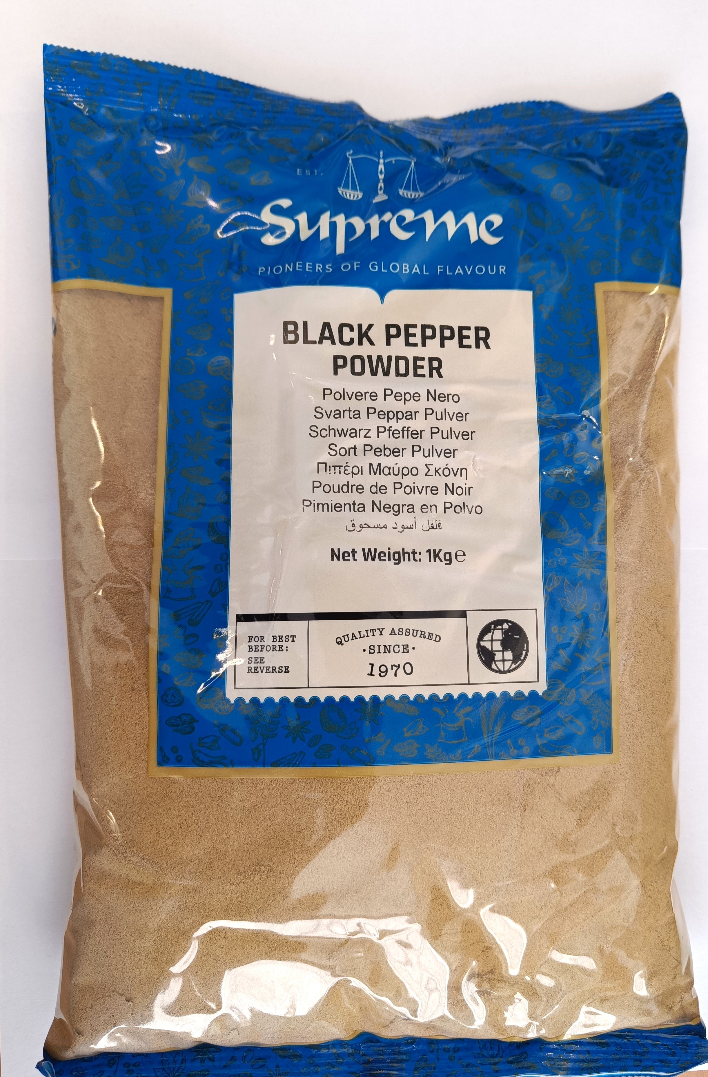Black pepper powder in a 1kg Supreme brand container, ground spice for cooking and seasoning, shown in a clear jar.
