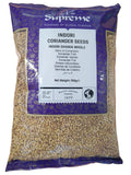 Supreme coriander seeds in a 700g bag, whole dried coriander spice for cooking and spice blends, on a kitchen surface.